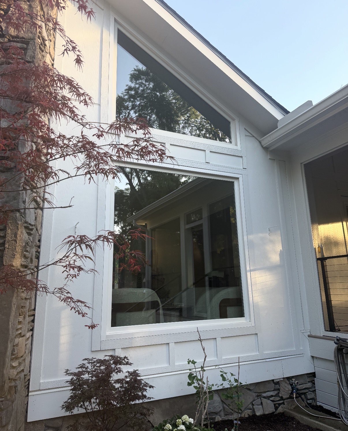 Spotless picture windows on a modern white home